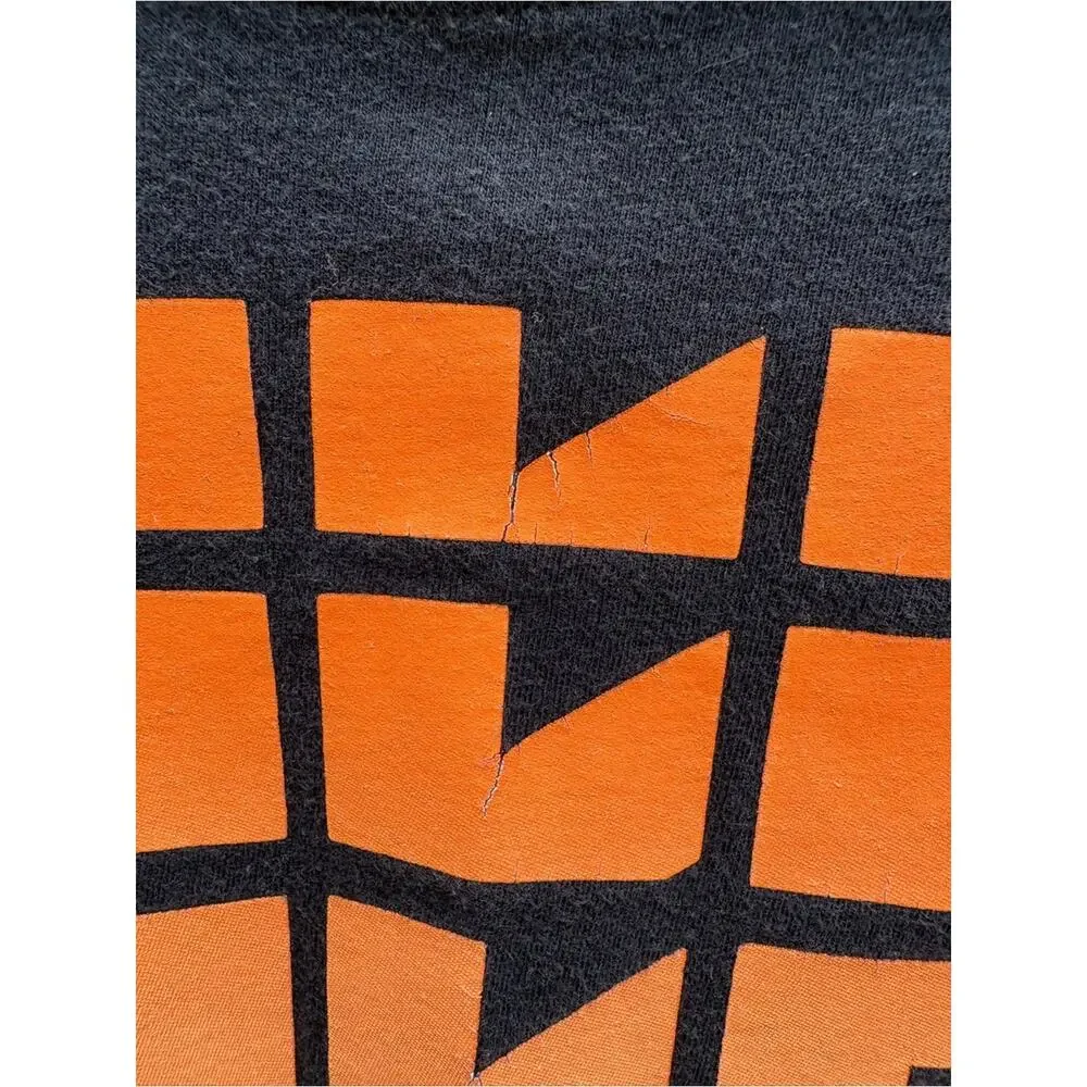 Nike Boys Black Tee with Orange-to-Yellow Stacked Logo- size M